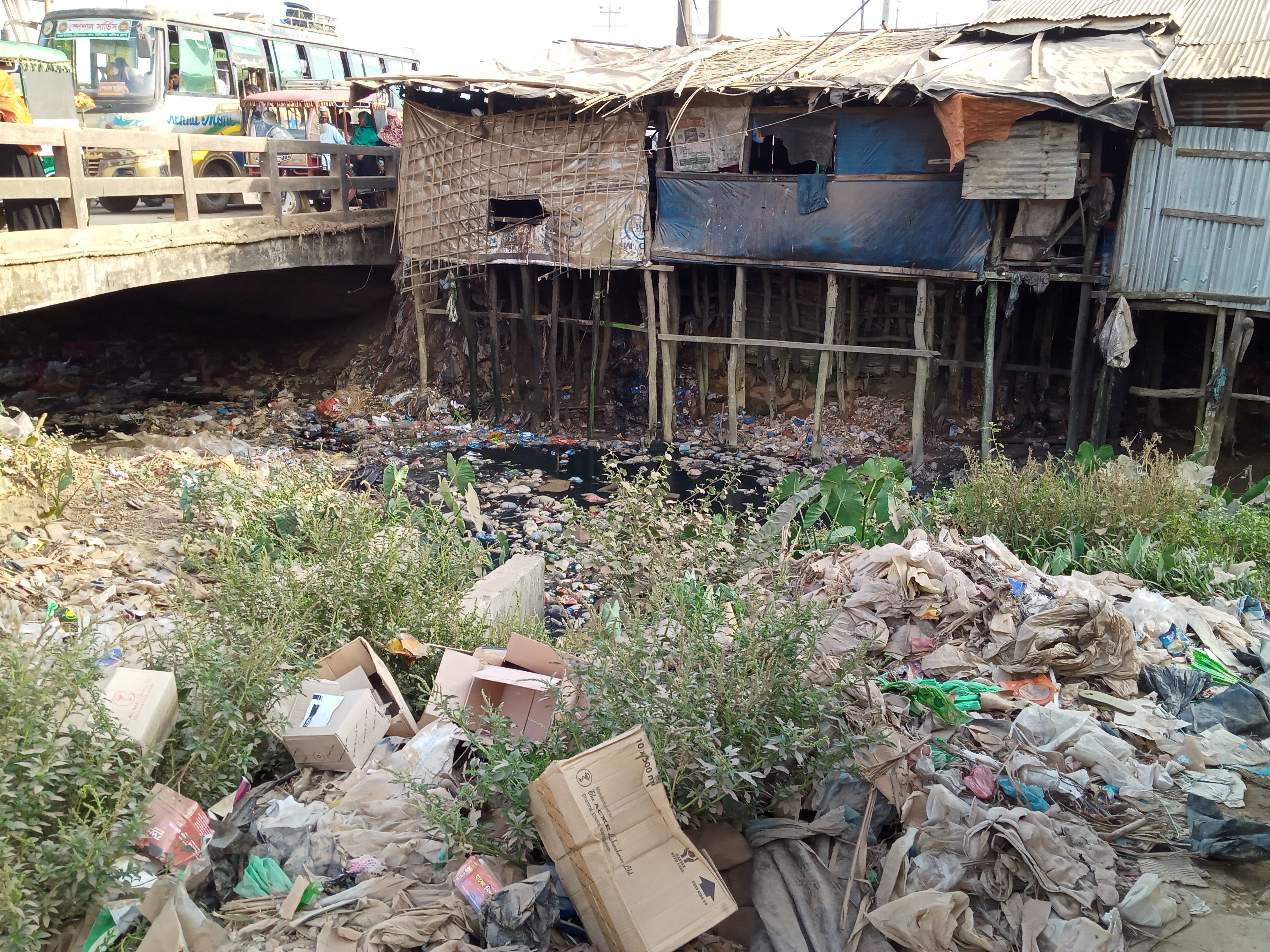 পালংখালী বাজারের খালটি দুইপাশের দোকানে গিলে খাচ্ছে বিলীন হইতে যাচ্ছে খাল।